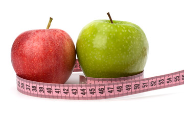 Apple with tape measure. Healthy lifestyle concept.