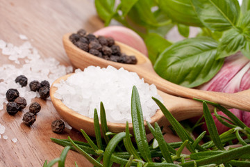 Fresh herbs and salt spoon