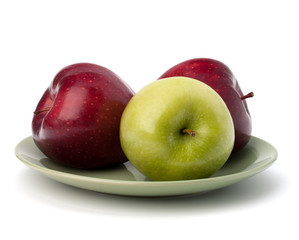 Apples pile on plate