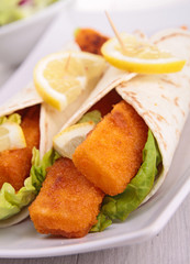 fajitas with fishsticks and salad