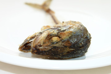 Thai Mackerel bone on white dish;