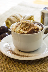 Hot chocolate cup with whipped cream