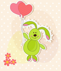 Beautiful toy bunny with hearts