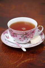 A cup of tea on a wooden table