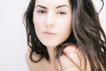 Obraz premium Sensual brunette on white