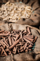 Spices and herbs in bags at market in India