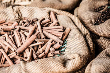 Spices and herbs in bags at market in India