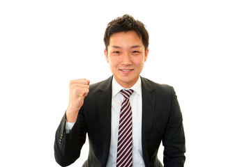 ガッツポーズのビジネスマン