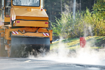 compactor roller at asphalting work