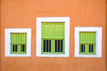 Fototapeta na wymiar wall with three windows