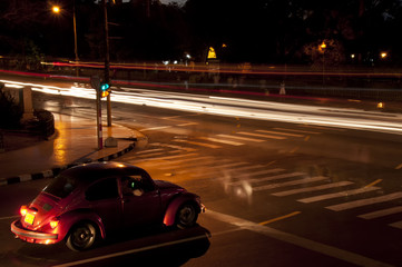 Oldtimer beatle car in night streets of Havana, Cuba