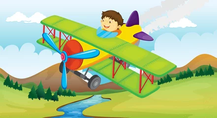 Foto op Plexiglas Vliegtuigen Een jongen en een vliegend vliegtuig