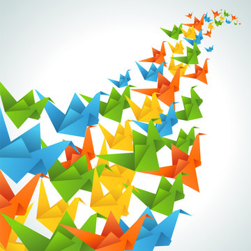 Origami paper birds flight abstract background.
