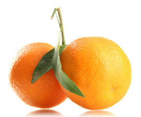 Ripe sweet tangerines with leaves, isolated on white