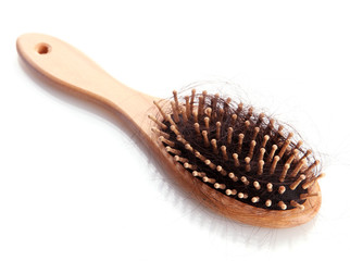 comb brush with lost hair, isolated on white