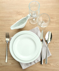 Table setting on wooden table