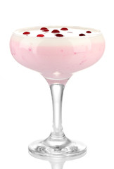 Glass of yoghurt dessert with berries, isolated on white
