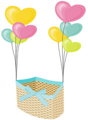 Wicker basket with hearts balloons
