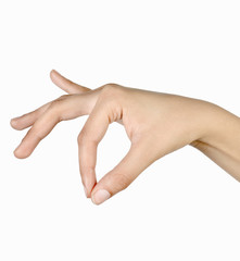 Close-up of a person's hand making a pinching gesture