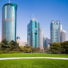 Obraz premium city park with modern building background in shanghai