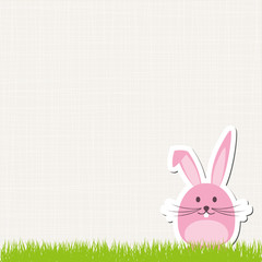 Rosa Hase steht auf Rasen