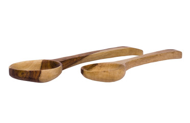 Close-up of two wooden serving spoons