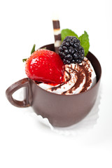 Chocolate coffee cup filled whith mousse