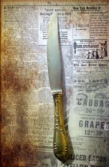 Photo sur Aluminium Journaux Vieux couteau en argent