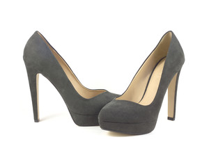 Two beautiful woman's suede shoes with high heel isolated
