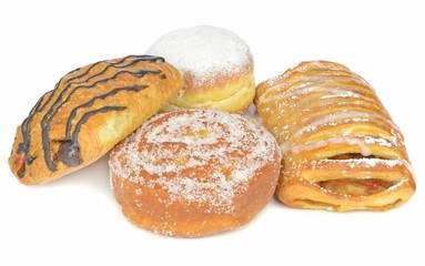 Fototapeta premium A selection of cakes on a white background