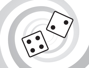 Dice rolling in front of spiral background