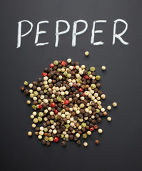 pepper on black background