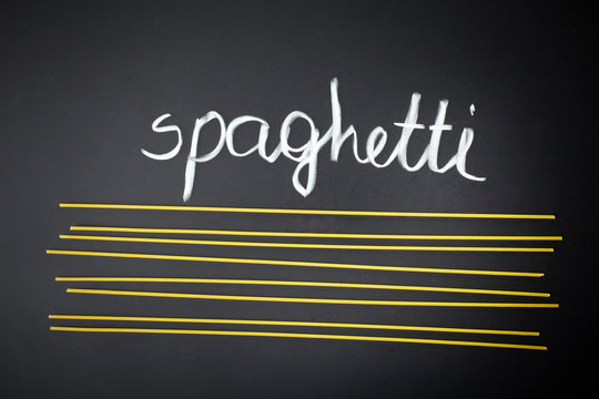 spaghetti on black background