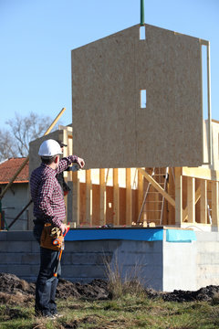 Foreman Directing Crane