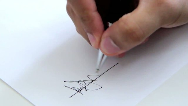 Businessman signing documents