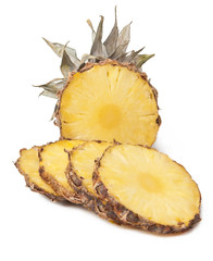 Pineapple with slices on white background