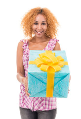 Cheerful woman holding a gift bag