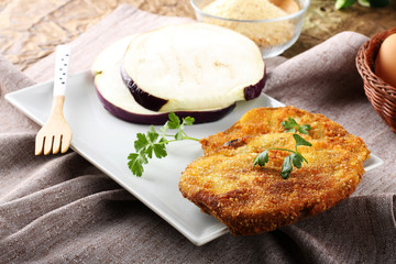 Eggplant cutlet  with beaten egg and breadcrumbs