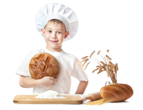 Cute Baker Boy With A Loaf Of Rye Bread