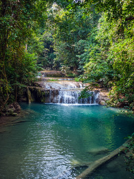Waterfall in the rainforest. Erawan National Park in Thailand.