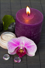 Obraz na płótnie Canvas orchid spa z świeczki