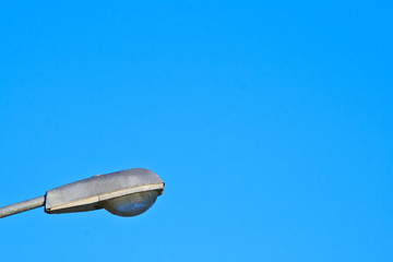 lamppost in blue sky