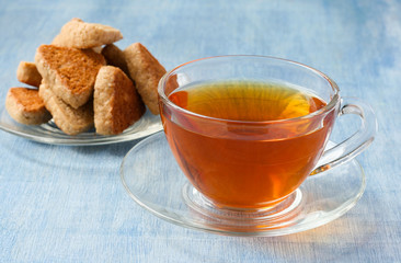 Cup of tea and biscuits on the background