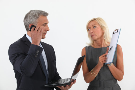 Senior business couple in the middle of a deal