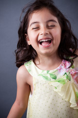 East Indian girl laughing