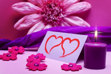 romantischer pink rosa hintergrund mit kerze
