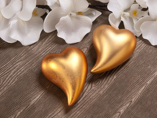 Orchideenblüten mit goldenen Herzen