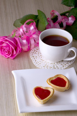 Holiday Tartlets with jam near the cup of tea