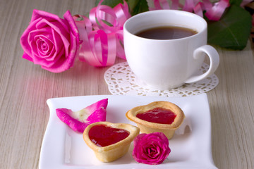 Holiday Tartlets with jam near the cup of tea