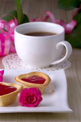 Holiday Tartlets with jam near the cup of tea